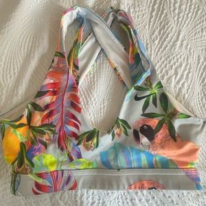 Nike dry fit sports bra. Tropical print. Never worn. No tag. New. Size small